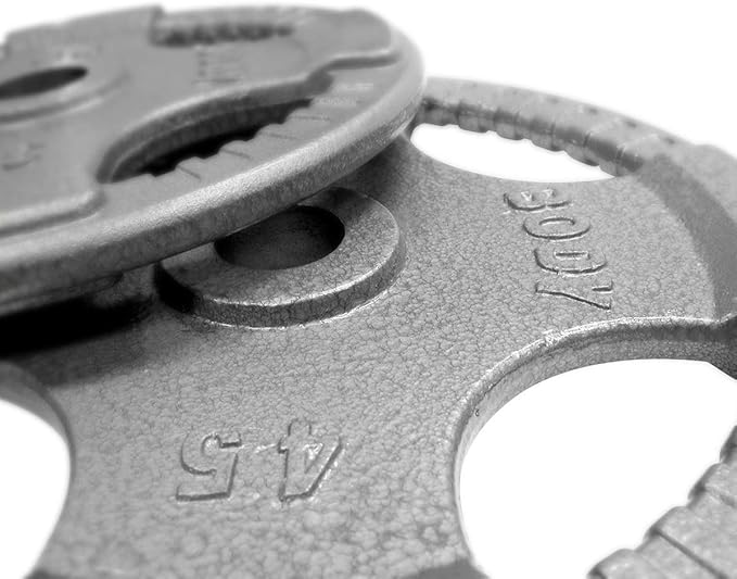 Body-Solid Cast Iron Olympic Quad Grip Design Weight Plate Set - Free Weights, Dumbbell Plates, 2 Inch Standard Hole for All Barbell Types